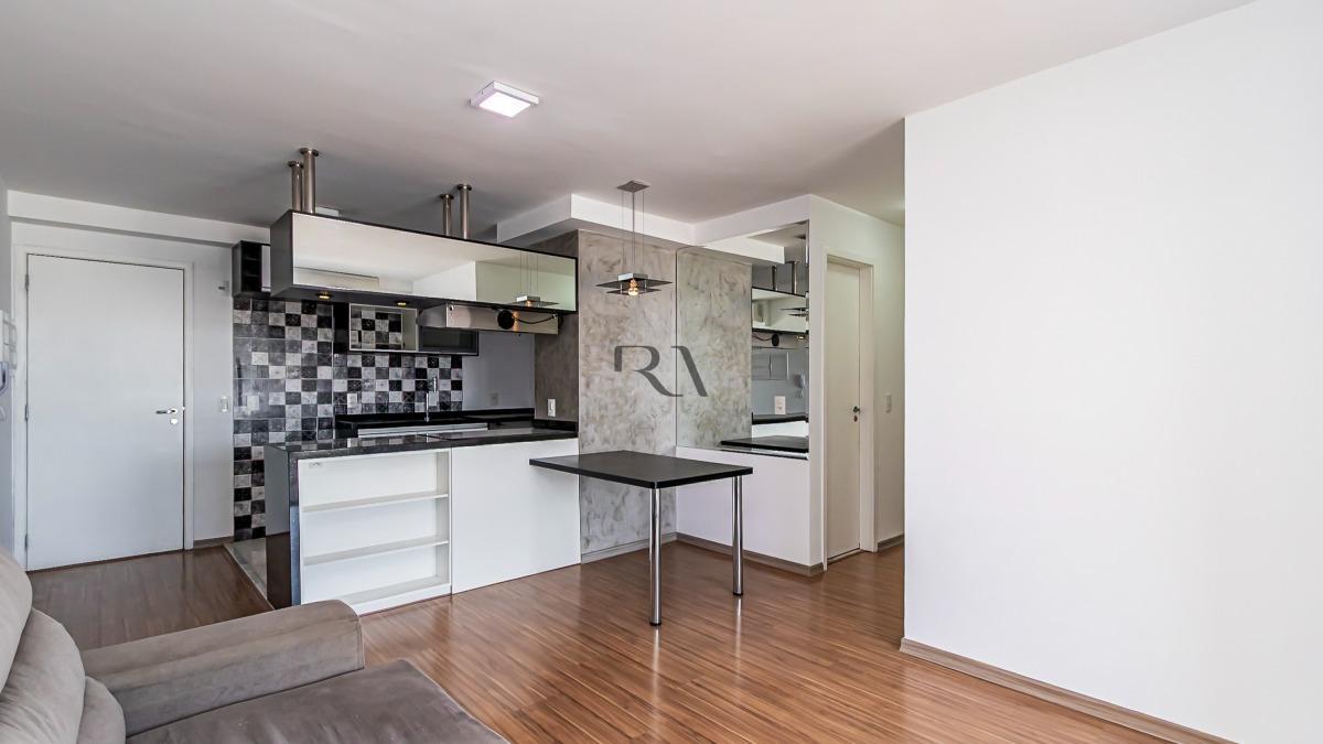 Sala de estar de apartamento de 79 m² à venda no Água Verde, em Curitiba